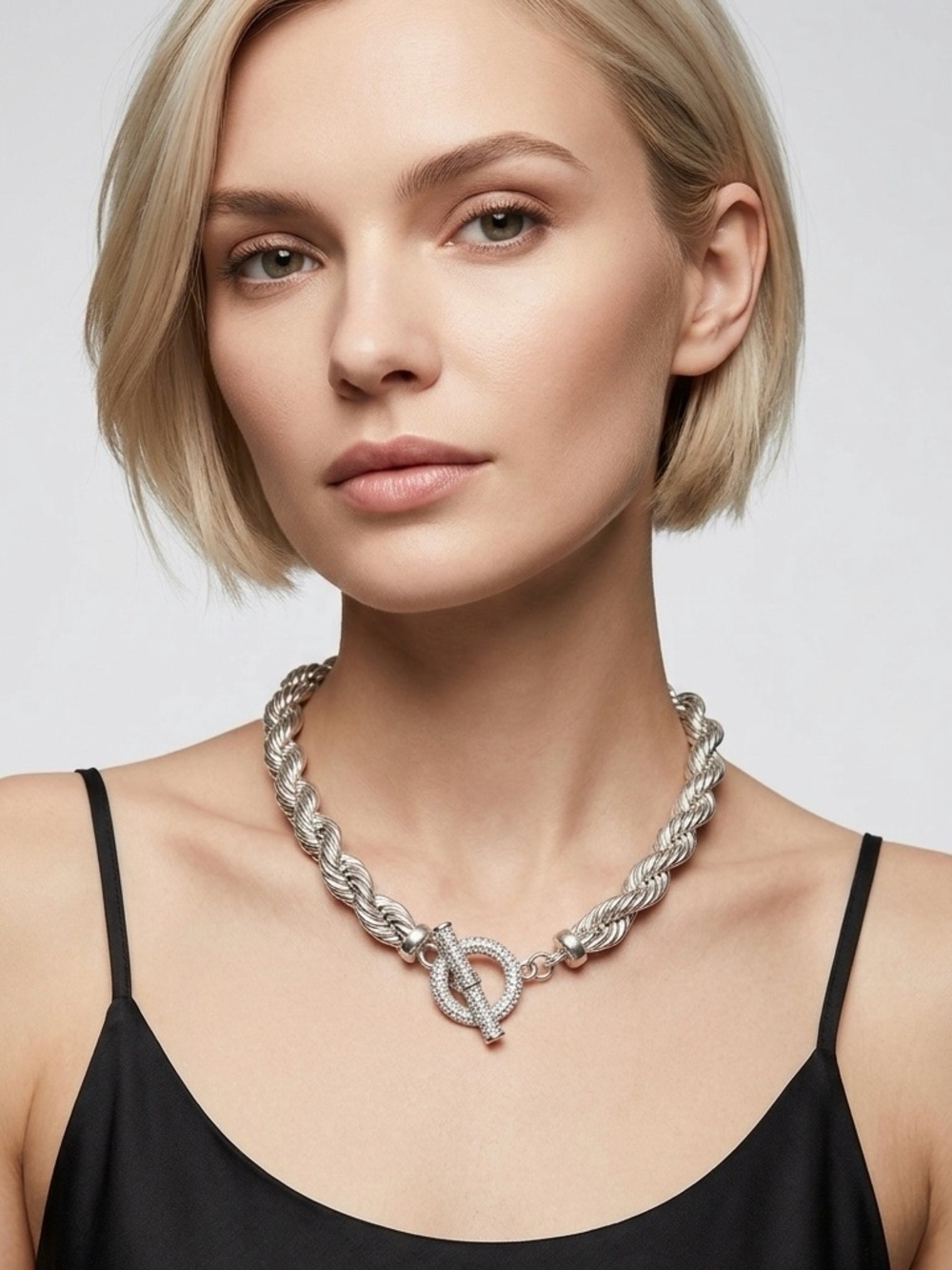 Traci Lynn silver-tone rope necklace with a distinctive rhinestone-encrusted